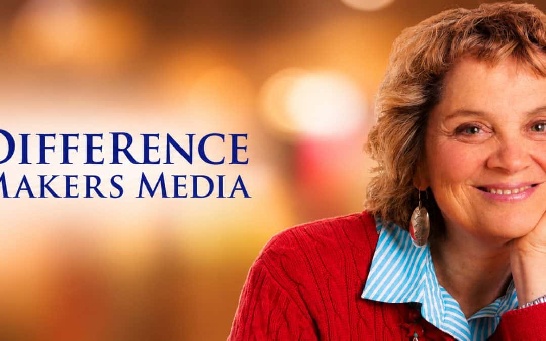 Logo of Difference Makers Media alongside a smiling woman, representing community engagement and media solutions for positive impact.