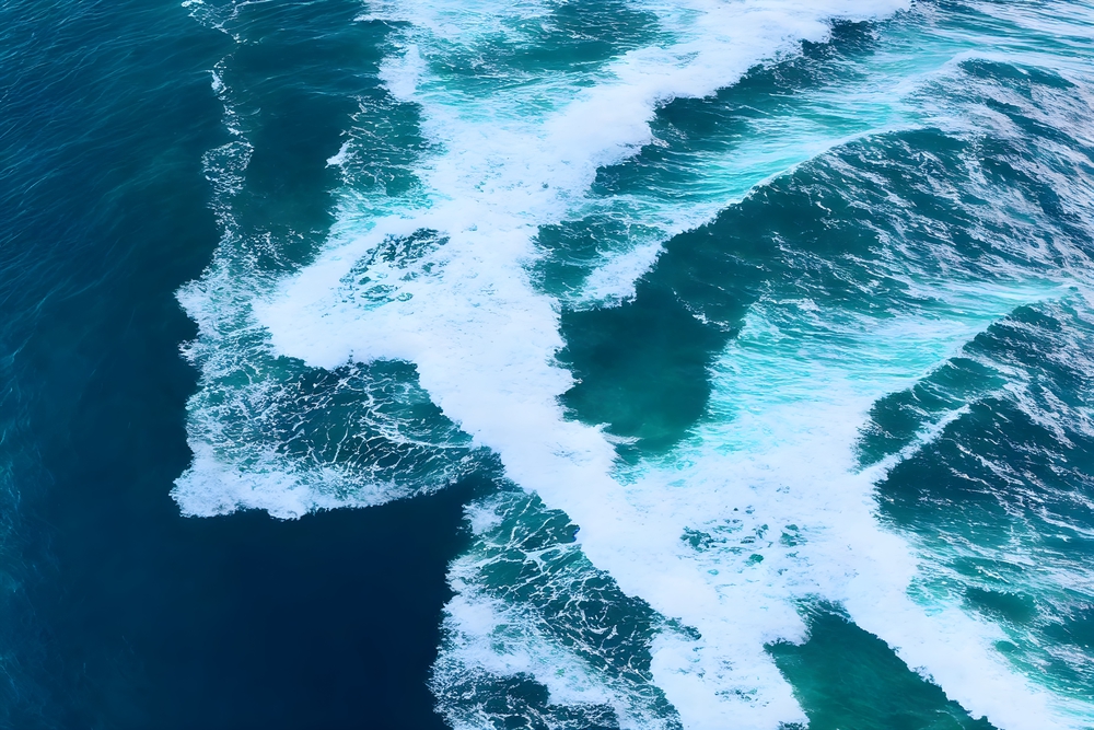 Aerial view showing waves of water.