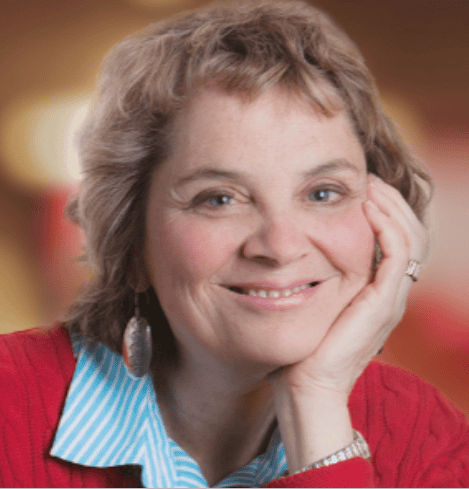 A friendly woman smiling, representing Difference Makers Media, committed to impactful storytelling and media solutions that inspire positive change and community engagement.